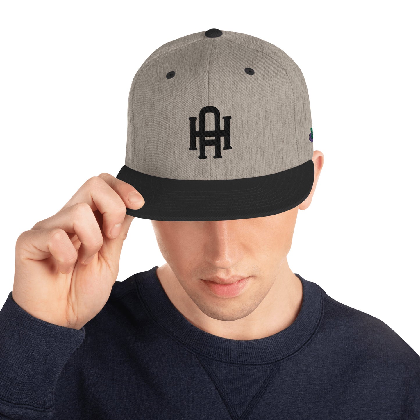 Initial snapback cap