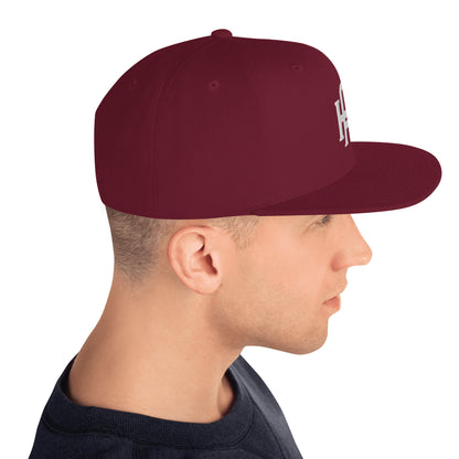 Initial snapback cap