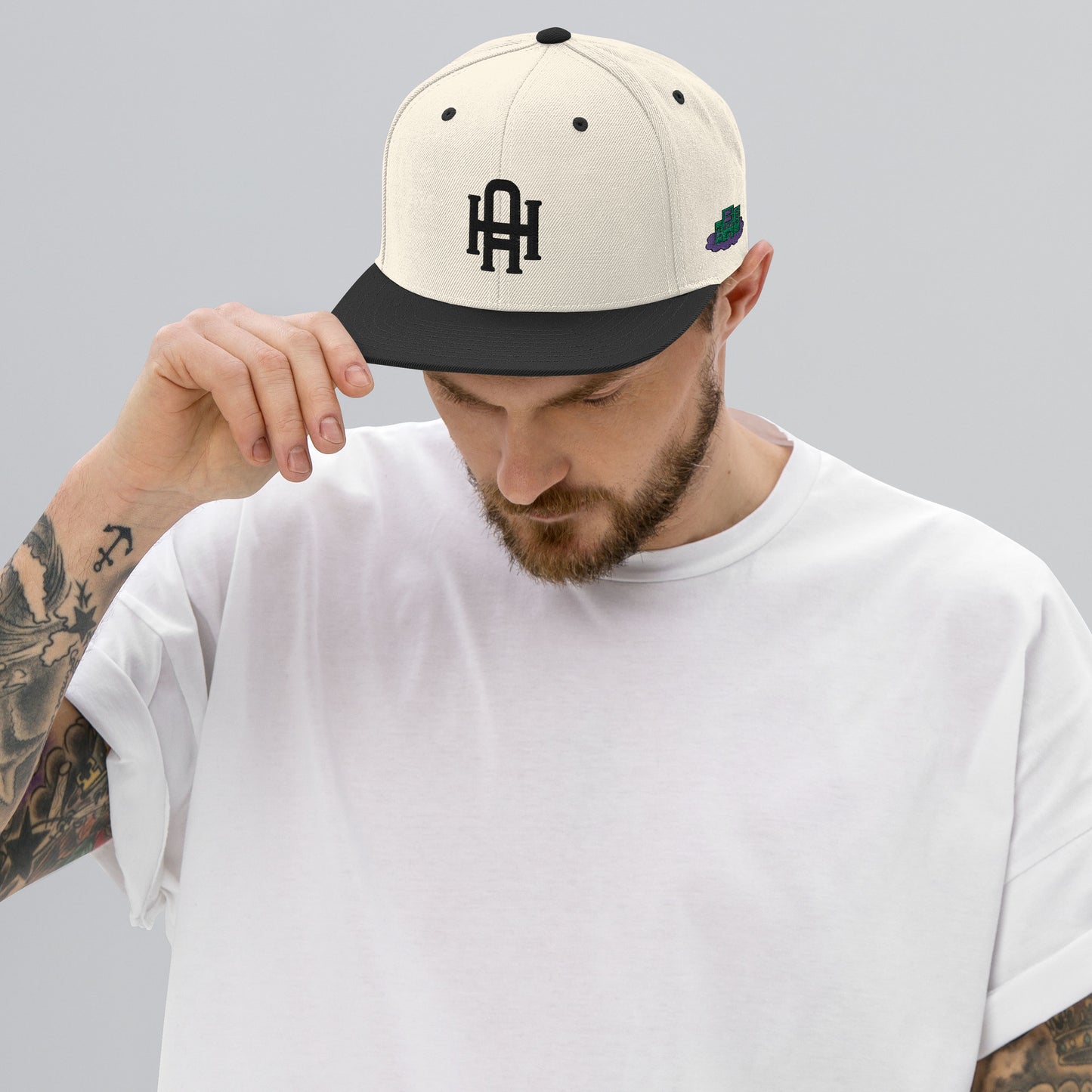 Initial snapback cap