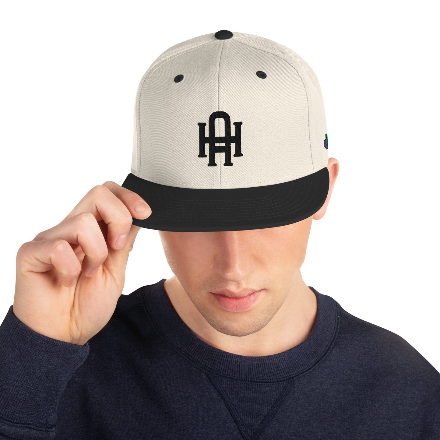 Initial snapback cap